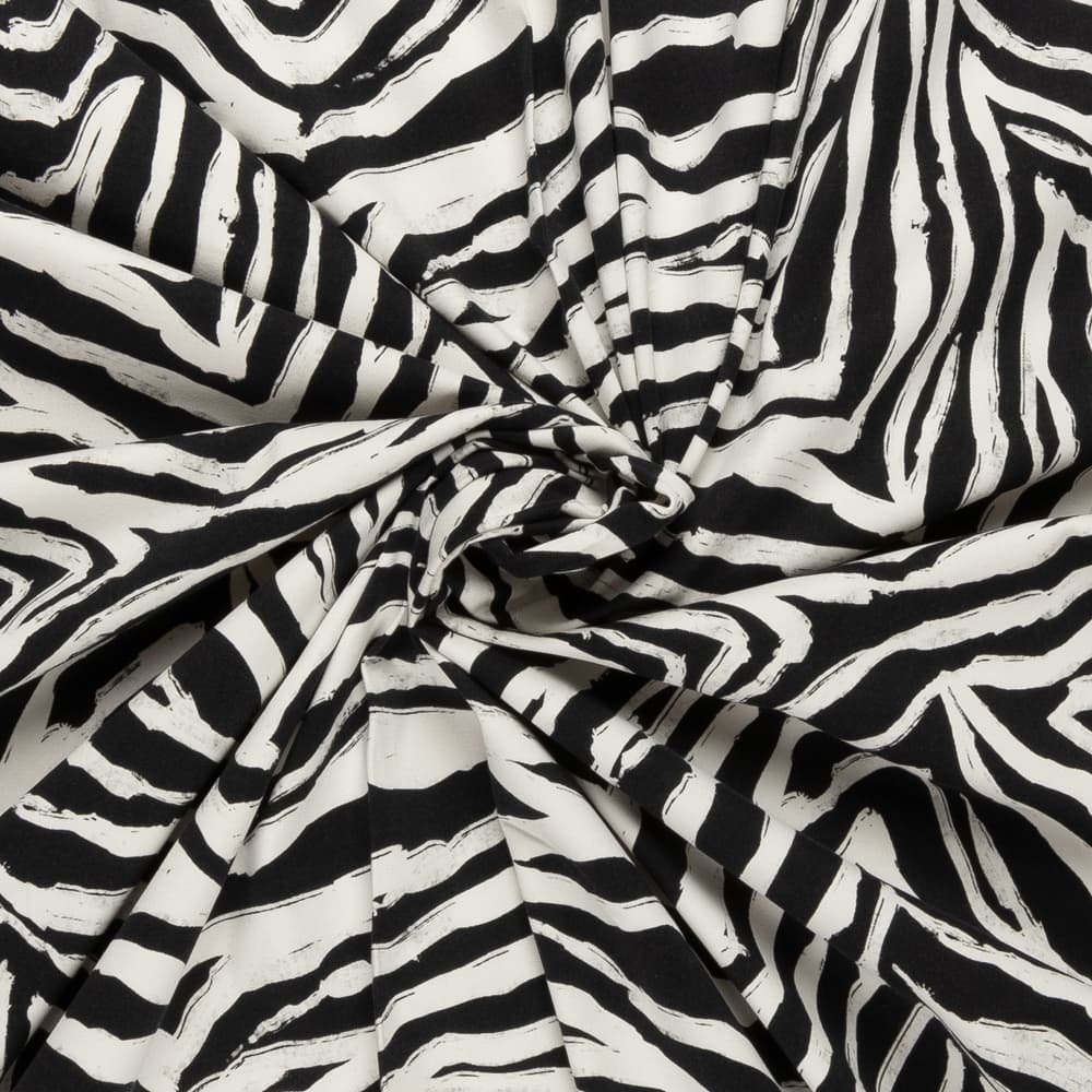 Stretch katoen met zwart off white animal dessin italiaans import - katoen Stoffen - zwart - 145 cm breed
